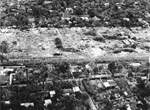 Prints of Aerial view showing houses being cleared away to make a 100-meter (33-foot) death strip on the East Berlin side of the border at Koellnische Haide in Nau Koslin, Berlin, Germany, October 1961 Berlin Wall (Antifascistischer Schutzwall) Prints: Clearing Land For Berlin Wall