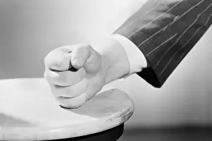 Closed Prints: Clenched Fist on Table