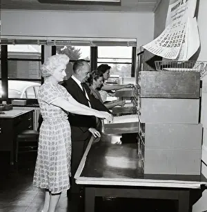 File Prints: Clerks Go Through Card Catalog Files