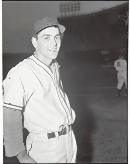 Prints of (Original Caption). Tribe's New Infield Duo. Lou Boudreau, one time University of Illinois basketball captain, is shortstop of Cleveland Indians Hoops Through Time: A Visual Journey of Basketball History: Cleveland Rookie Lou Boudreau in Serious Pose