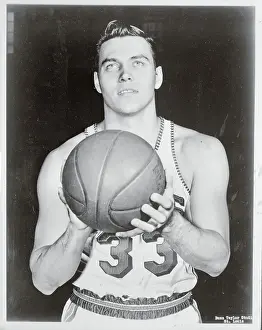 Prints of (Original Caption). Cliff Hagen of the Hawks Hoops Through Time: A Visual Journey of Basketball History: Cliff Hagen Holding Basketball