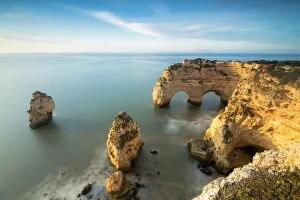 Images Dated 17th April 2016: Cliffs framed by turquoise water Praia da Marinha Portugal