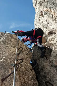 Recreational Pursuit Collection: Climber on the Masara-Corda Rossa via ferrata, Dolomites, South Tyrol, Italy, Europe