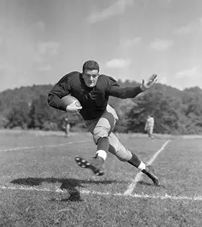 Clint Frank in Football Action