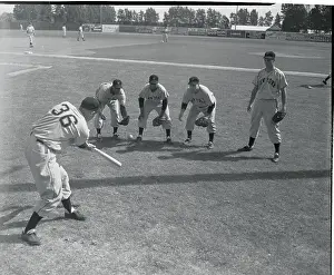 Sanford Prints: Clint Hartung Hitting Ball to Players