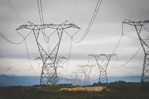Electric Prints: Close up image of overhead power lines sending electricity country wide