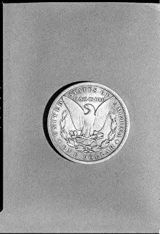 Dollar Prints: Close-Up Of Silver Dollar