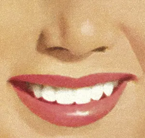 Close-up of a womans smile with red lips and white teeth