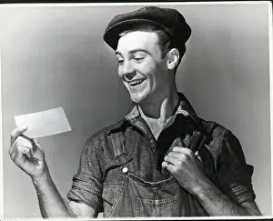 Overalls Prints: Close-Up Working Man Smiling At Paper