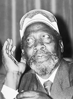 Colonialism Prints: Closeup Of Jomo Kenyatta Hand To Ear