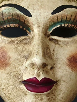 Images Dated 8th July 2018: Closeup of a paper mache Venetian mask depicting a beautiful womans face, eyes, nose and mouth