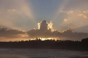Clouds Are Backlit By The Sun At Sunset At Incinerator Rock Area Of Long Beach In Pacific Rim National Park Near Tofino