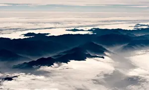 Clouds over mountain range