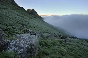 Escarpment Prints: Clouds rising along a grassy slope in the Royal Natal section of the Drakensberg Mountains