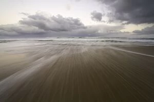 Clouds, surf, beach, Great Otway N.P. Australia