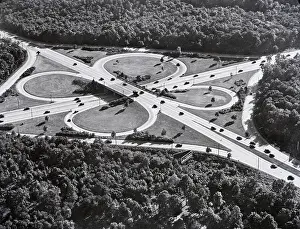 Strange Prints: Cloverleaf Intersections of Highways
