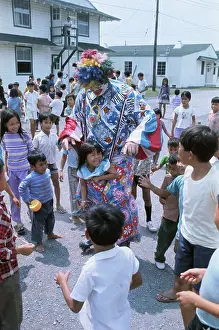 Clown Entertaining Children in Refugee Camp