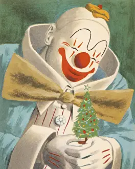 Clown Holding a Little Christmas Tree