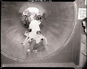 Amusement Park Prints: Clown and Kids in Rolling Barrel