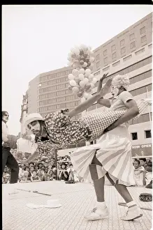 Clowns Breakdancing Together
