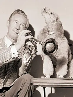 Clyde Mccoy Playing Trumpet with His Dog