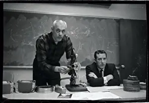 Bloomington Prints: Coach Adjusting Film Projector