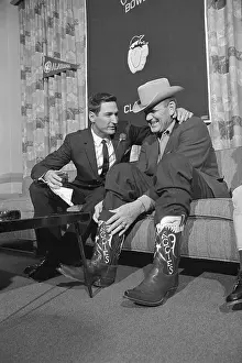 Coach Bear Bryant and Gene Stallings Sitting on a Couch