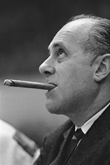 Coach Red Auerbach with Long Cigar in His Mouth