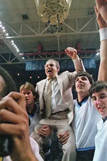 Coach Rollie Massimino Being Carried by His Team
