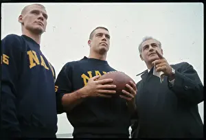Coach Talking with Team Captain and Player