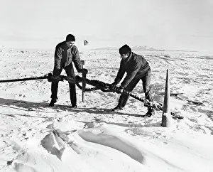 Anchor Prints: Two Coast Guardsmen Anchoring in Ice