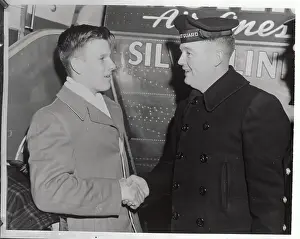 Coastguardman Shaking Hands with Boy Scout