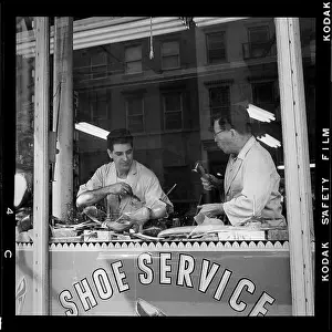 Prints of BROOKLYN, NY - MARCH 1958: Two cobblers work inside a shoe repair store in Brooklyn Heights, in March 1958 in New York City, New York. (Photo by David Attie/Getty Images) Portraits, Artworks, and Montages from a Visionary Photographer: Cobblers in 1950's Brooklyn Heights