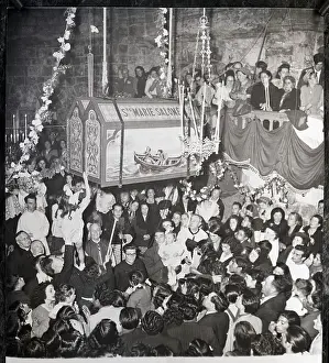 Pilgrimage Prints: Coffin Being Lowered Into Crowd