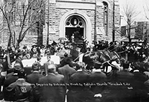Coffin Prints: Coffins Pass in Front of Catholic Church