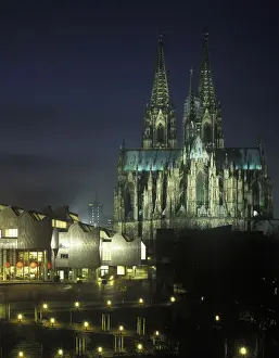 Concert Hall Prints: Cologne Cathedral and Philharmonie philharmonic hall at night