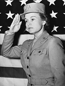 Saluting Prints: Colonel Oveta Culp Hobby Saluting in Front of Flag