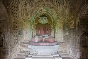 Colored Buddha statue on a temple
