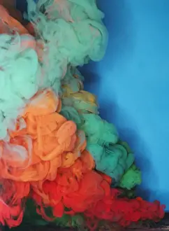 Prints of Colored smoke that rises up and mixed into beautiful abstractions on blue a background Stone Prints: Colored smoke