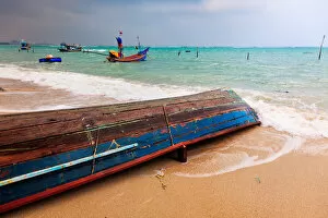 Colorful fishing boats at shores of Natien