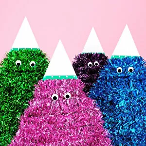 Images Dated 14th December 2017: Colorful tinsel characters with google eyes