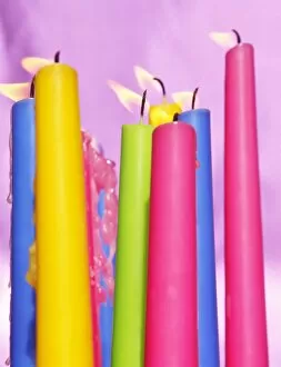 Colourful candles blowing in the wind