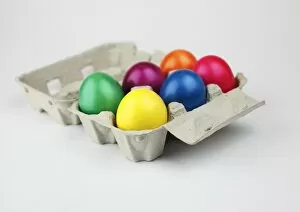 Images Dated 4th May 2011: Colourful Easter eggs in an egg box