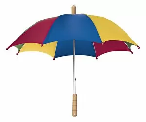 Colourful open umbrella with wooden handle, front view