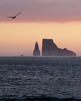 Colourful sunset behind Kicker Rock, Galapagos