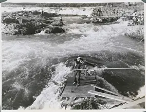 Columbian Natives Searching for Salmon Catch