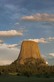 Images Dated 2nd July 2011: Columnar basalt formations with clouds at sunset, Devils Tower National Monument, Wyoming, USA