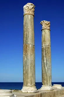 Nature’s Masterpiece: Columns with Corinthian capital in Roman theatre near the Mediterranean sea Leptis Magna Libya