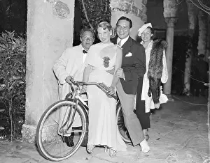 Bicyclist Prints: Comedian George Jessel with Boxer Max Baer on Bicycle