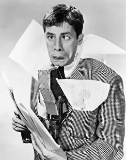 Eyes Crossed Prints: Comedian Jerry Lewis at Microphone with Papers in Jacket